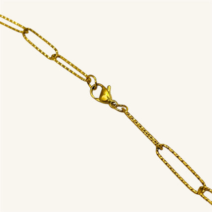 Ciondolo Curved Light Horn – Collana con catena a graffetta dorata