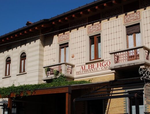 Hotel Restaurant Sala Spa in Italy, a charming building with balconies, offering relaxation and dining experiences for travelers.