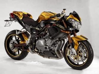 Moto naked Benelli TnT 899 Cafe Racer dorata e nera, ideale per appassionati di moto e viaggi su strada. Design aggressivo e prestazioni elevate.