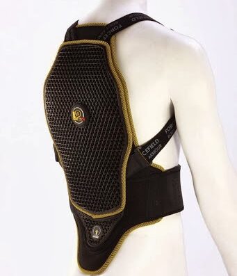Back view of a mannequin wearing a black and gold Forcefield motorcycle back protector, showcasing its design and protective features for motorcycle riders