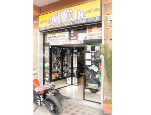 Japan Moto Line store front, offering motorcycle sales, service, and accessories. Features Honda, Yamaha, Suzuki, Kawasaki, Piaggio, and Aprilia brands.