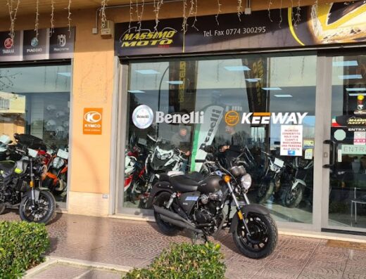 Massimo Moto Dealership: Benelli, Keeway, Sym motorcycles on display in front of the store, showcasing various models and brands.