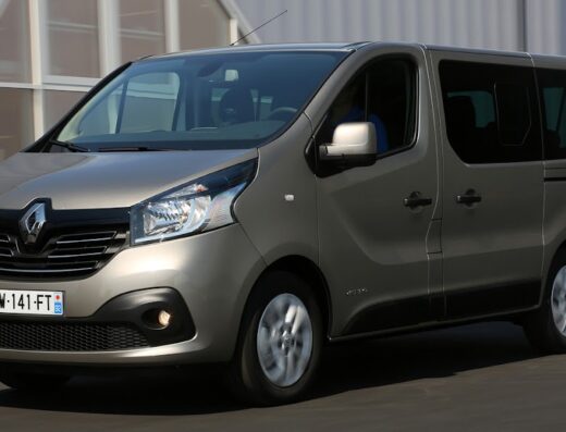 Renault Trafic van for car rental, seen from the front, ideal for group travel and tours.