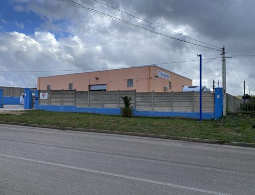 TrapassoAuto camper & caravan dealership exterior, showcasing the building and surrounding area for travel and vehicle enthusiasts.